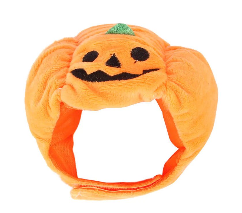 Pumpkin-shaped headband with a smiling face on a white background