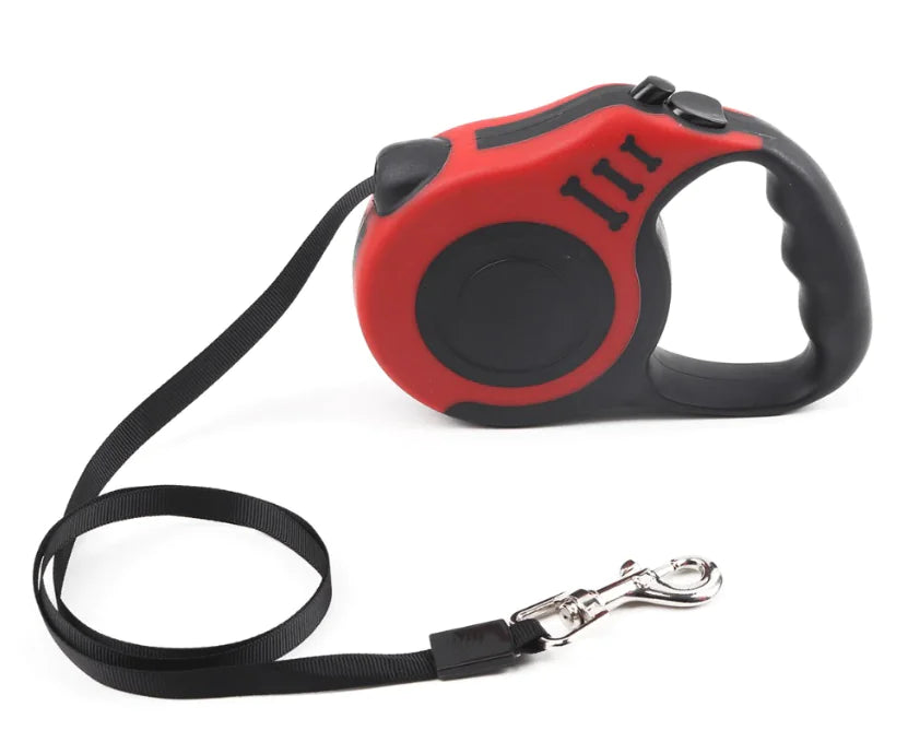 Red and black retractable dog leash on a white background