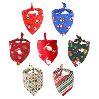 Set of Christmas-themed dog bandanas on a white background