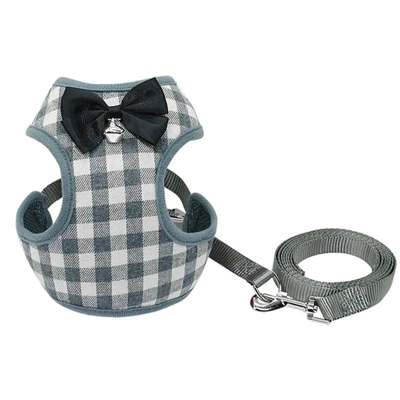 Pet harness with checkered pattern and black bow tie on a white background