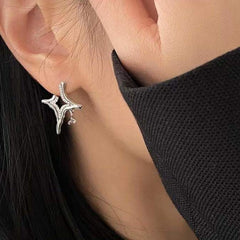 Asterism Rhinestone Earrings on ear